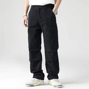 Black cargo pants with flap pockets and elastic cuffs