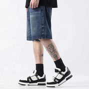 Dark blue washed denim shorts with faded detailing