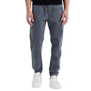 Grey tapered jogger pants with elastic cuffs