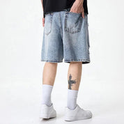 Light blue distressed denim shorts with faded wash
